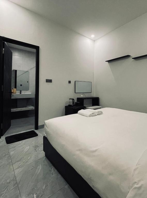 Giường trong phòng chung tại Ben Ben Hotel - Near City Center - Budget Stay