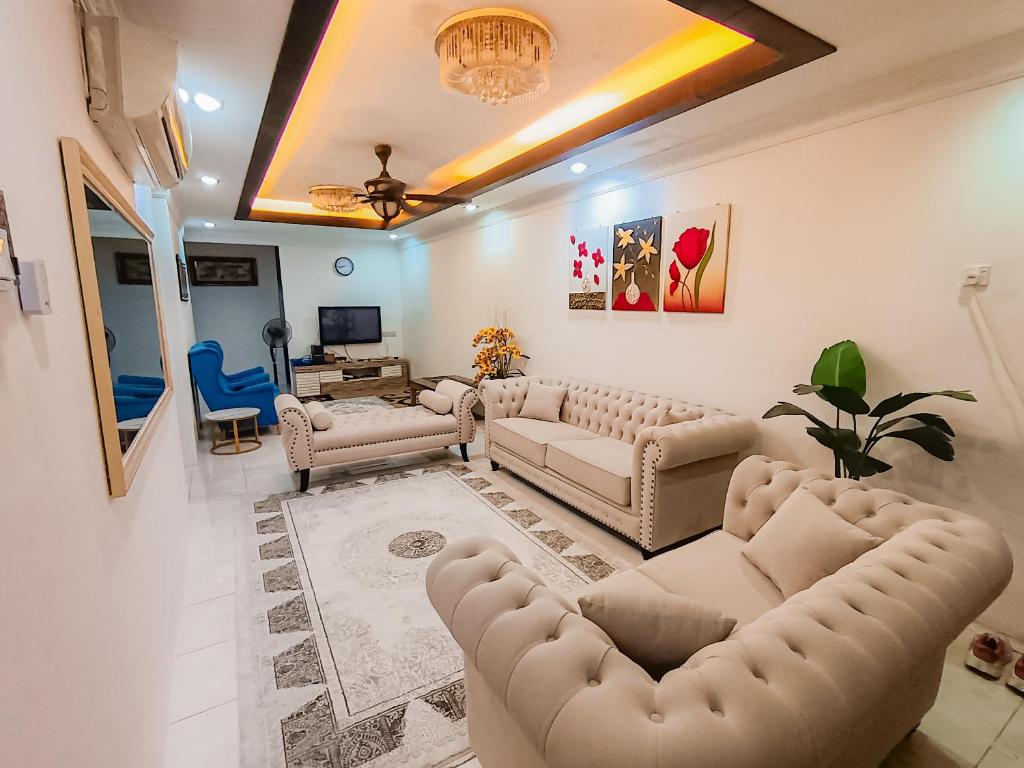 Χώρος καθιστικού στο Janaida Homestay Alor Setar