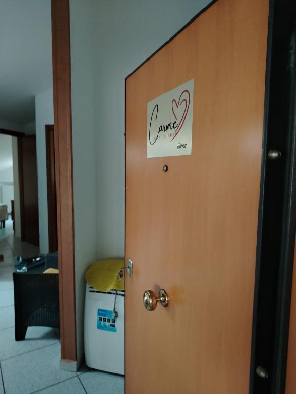 a door with a sign that says i love cancer on it at Carmenhouse in Montesilvano