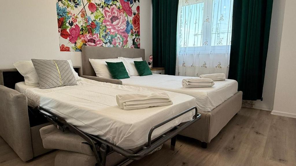 Postel nebo postele na pokoji v ubytování Rox Mountain View Apartament