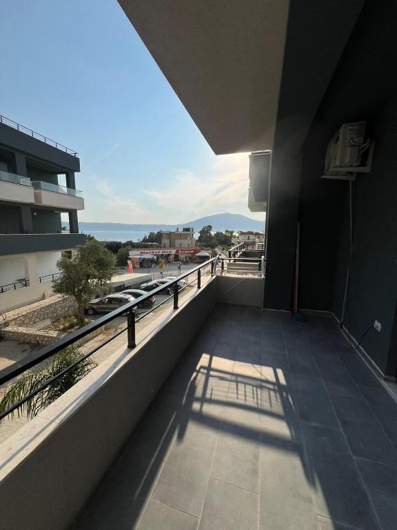 a balcony of a building with a view of a street at Eldi's Home in Vlorë