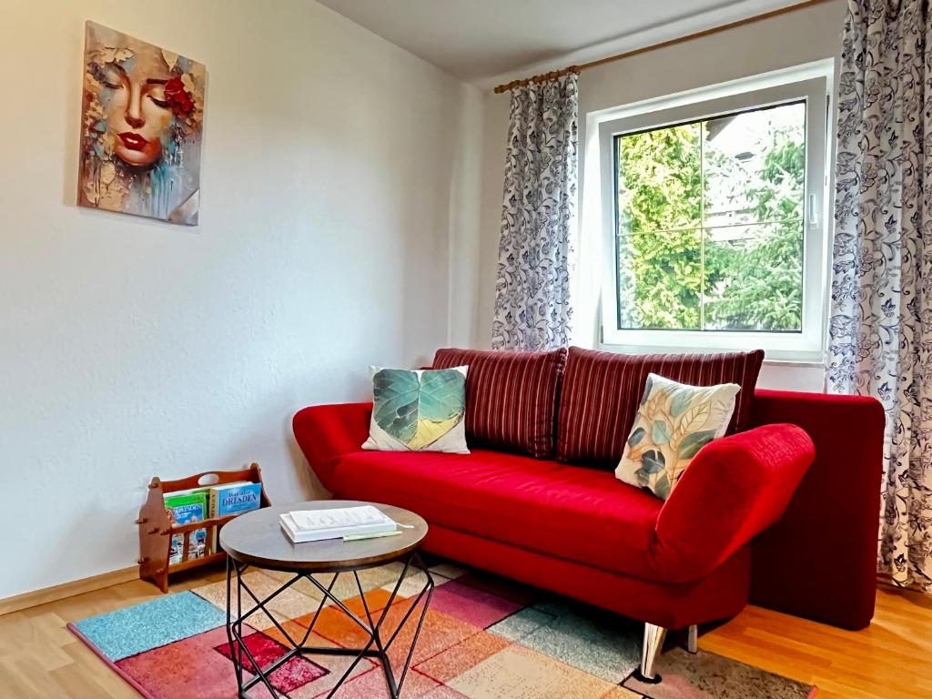 Χώρος καθιστικού στο Villa L & S - Gemütliche Ferienwohnung im Grünen bei Dresden