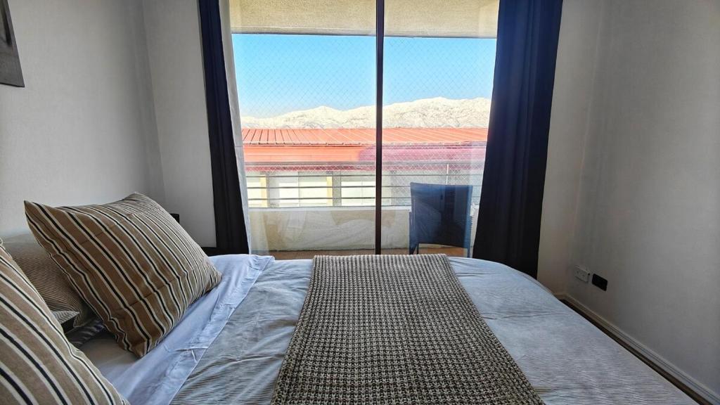Postel nebo postele na pokoji v ubytování Refugio Bellavista vista al Costanera y los Andes