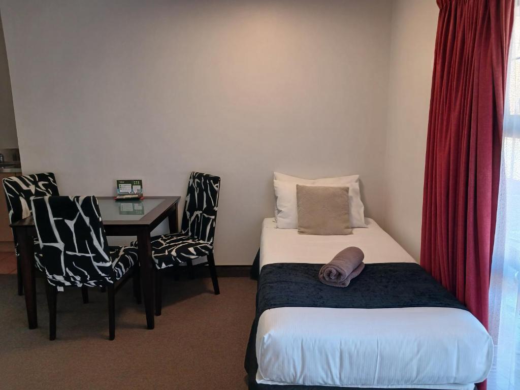 Palm City Motor Inn - Resim 25