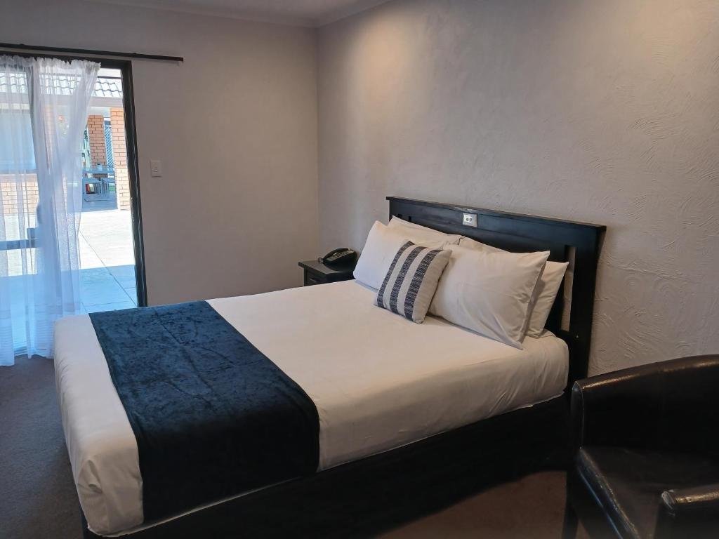 Palm City Motor Inn - Resim 27