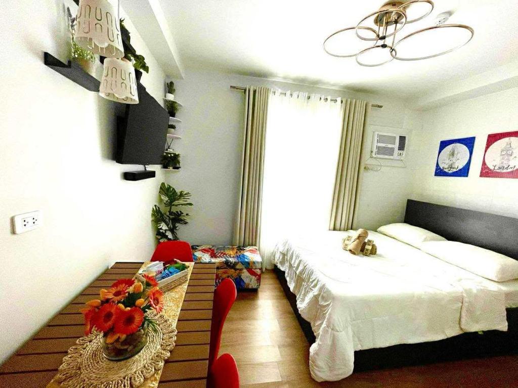 Ένα ή περισσότερα κρεβάτια σε δωμάτιο στο Solea Tropical Suite