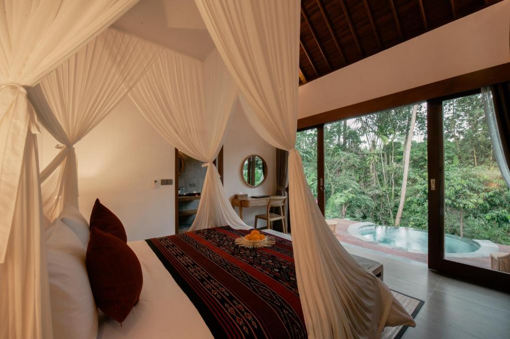 Postel nebo postele na pokoji v ubytování Shaka bali villa