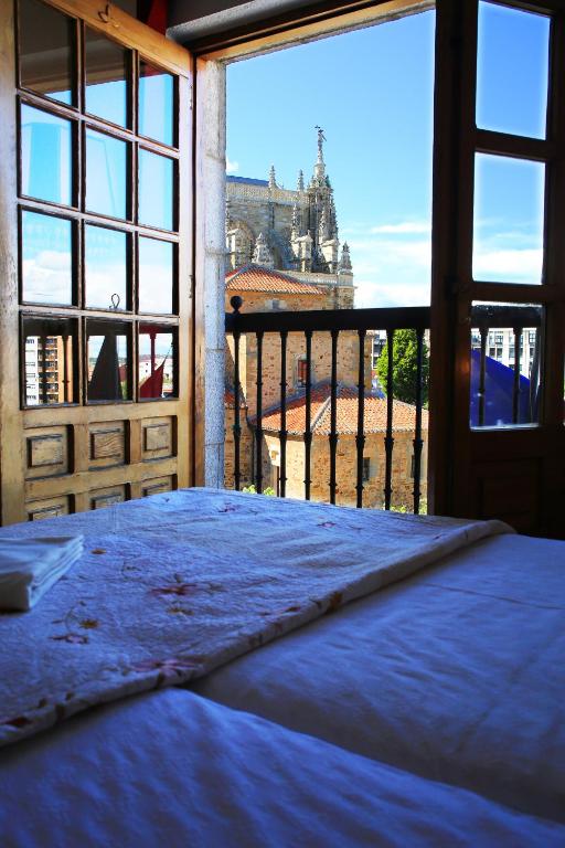 Postel nebo postele na pokoji v ubytování Hotel Gaudi