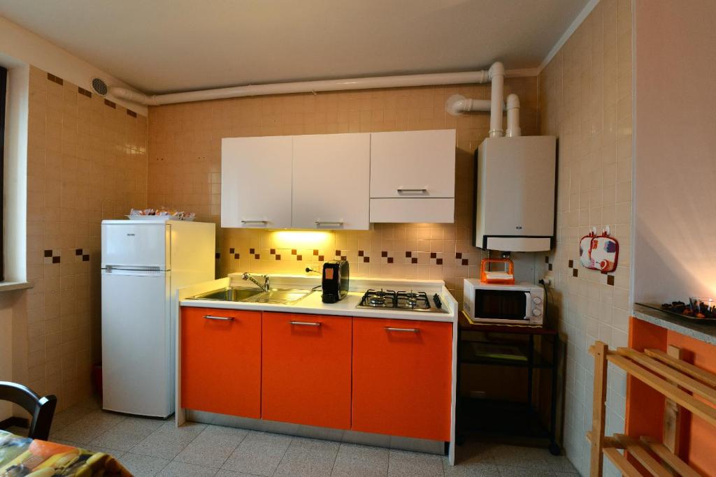 A kitchen or kitchenette at Le Palme Sona