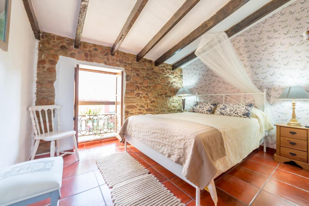 Postel nebo postele na pokoji v ubytování Villa Lupita