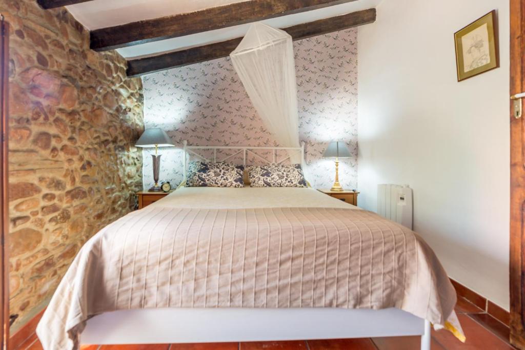 Postel nebo postele na pokoji v ubytování Villa Lupita