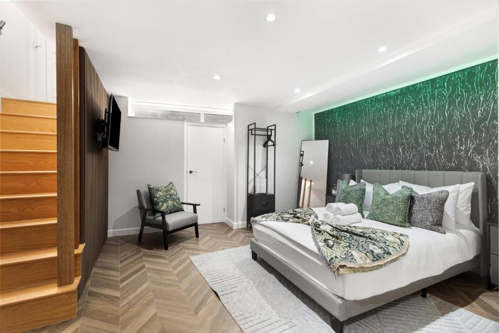 Ένα ή περισσότερα κρεβάτια σε δωμάτιο στο Luxury Studio Stratford London