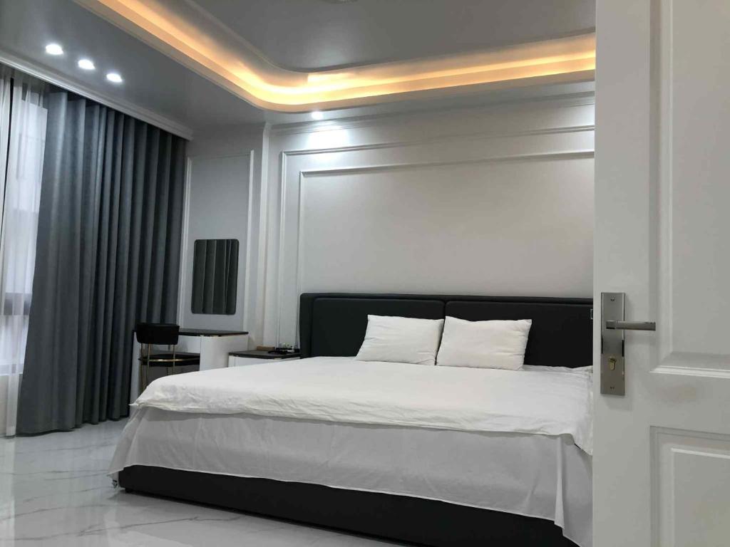 Postel nebo postele na pokoji v ubytování Ecorivers Hải Dương
