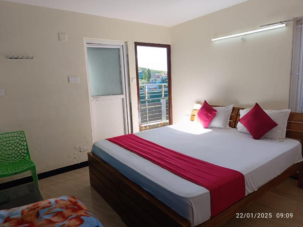 Ένα ή περισσότερα κρεβάτια σε δωμάτιο στο Queenhill Apartment