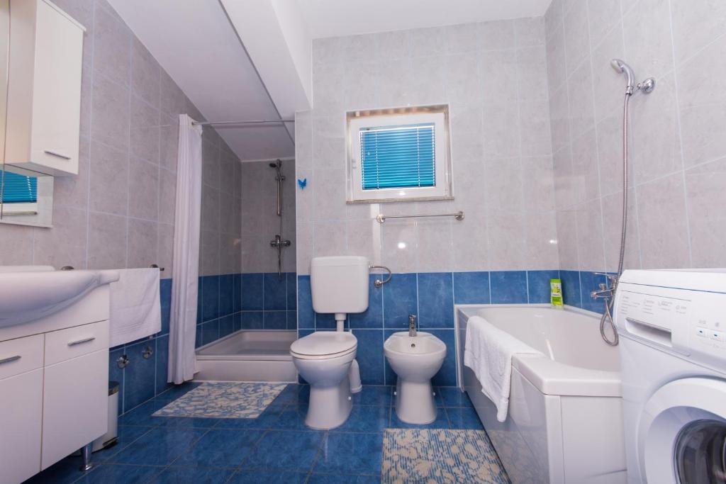 Kúpeľňa v ubytovaní Apartments Barba