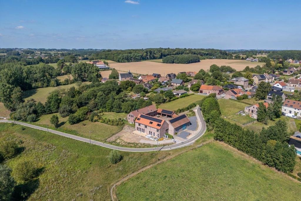 an aerial view of a house in a small village at Pachthof 1860 in Sint-Pieters-Leeuw