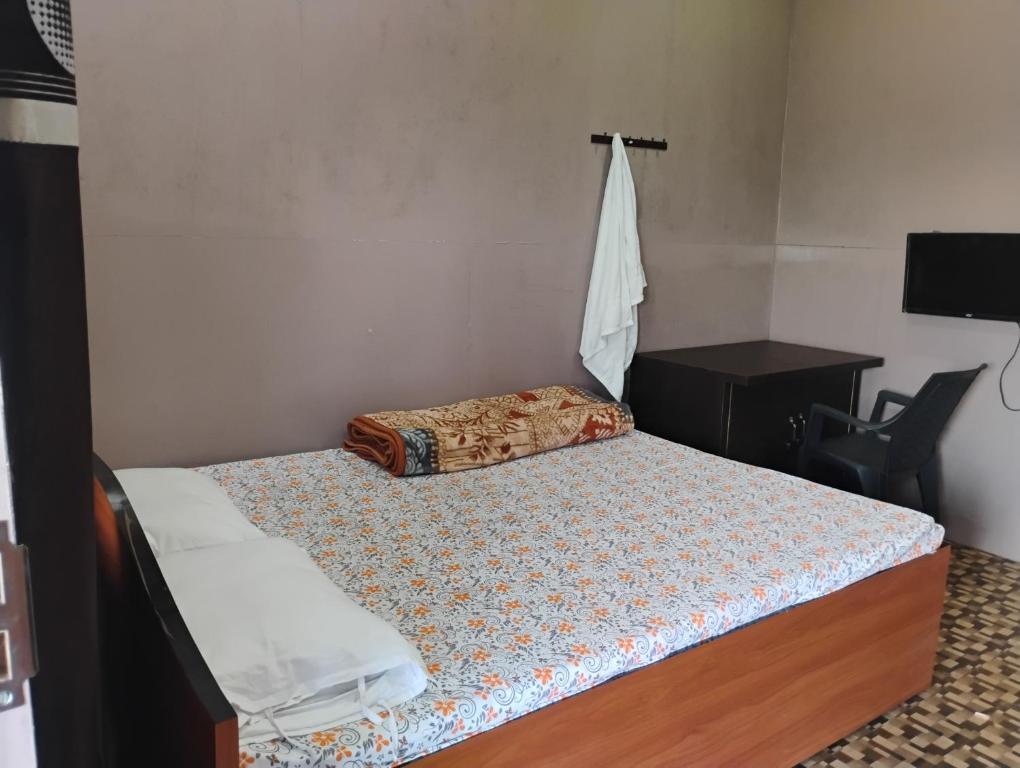 Ένα ή περισσότερα κρεβάτια σε δωμάτιο στο Digaru dream resort