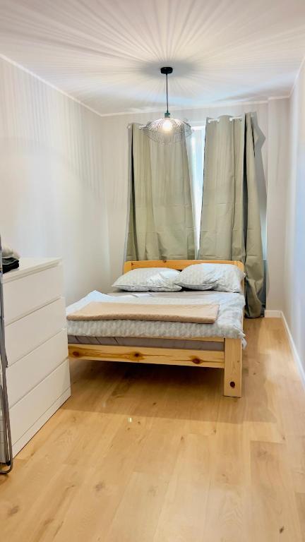 Postel nebo postele na pokoji v ubytování Przyjazny Kąt