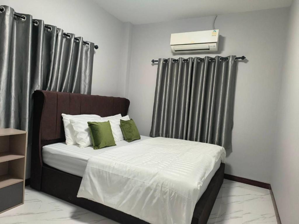 En eller flere senge i et værelse på 784 Pool Villa 2