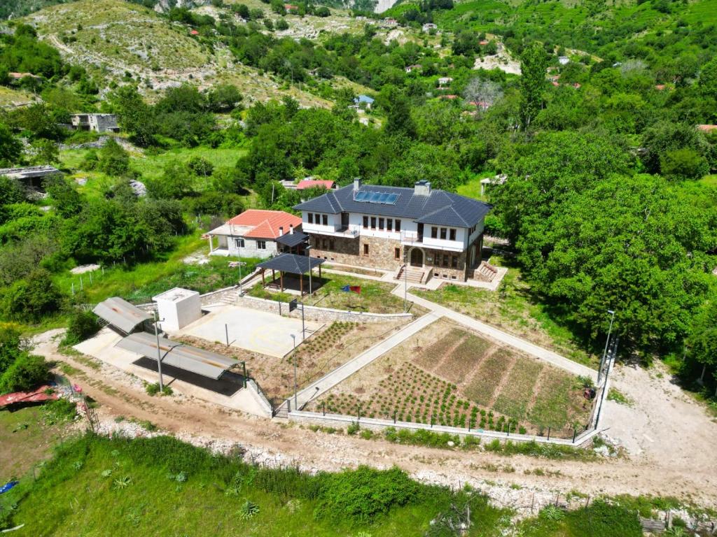 an aerial view of a large house with a yard at Vila Dr Bizhga Agroturizem 