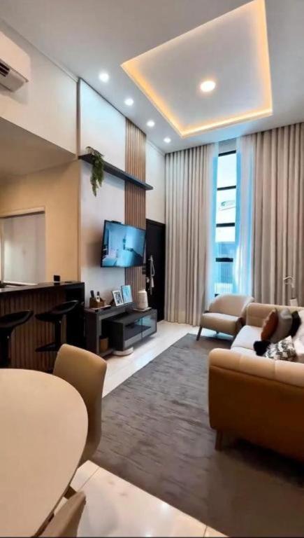 Posezení v ubytování Casa de estilo elegante com jacuzzi