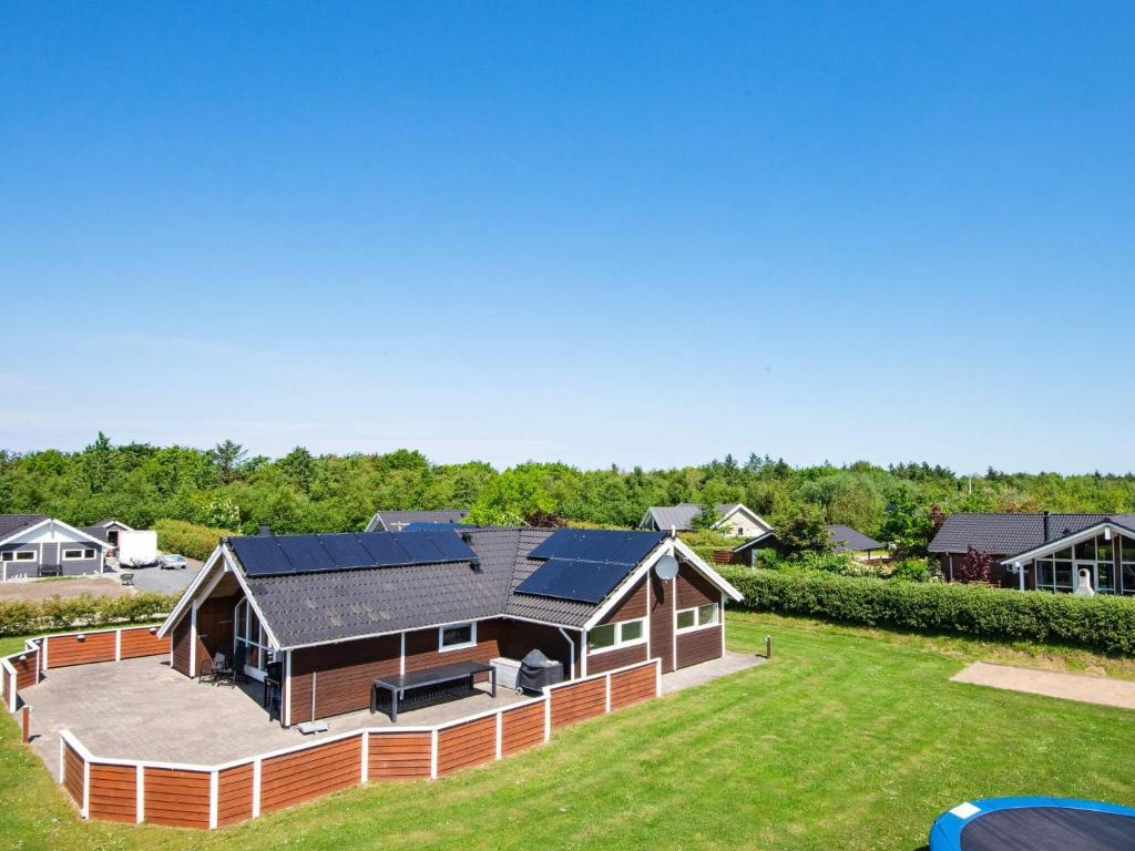 an aerial view of a house with solar panels on it at 4 star holiday home in Hemmet in Hemmet