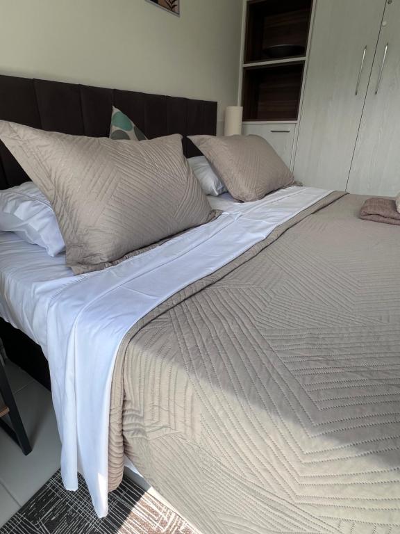 Katil atau katil-katil dalam bilik di Suite vista natureza no Rio Stay
