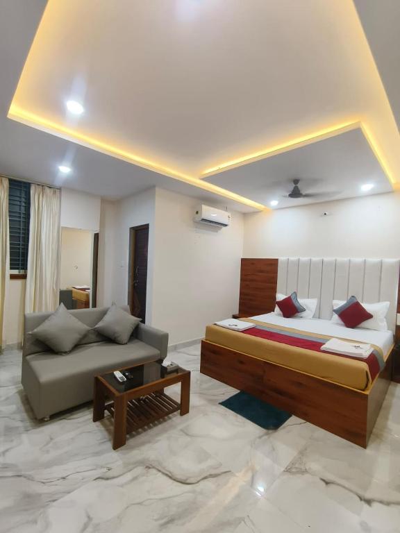 Una cama o camas en una habitación de Nandi residency