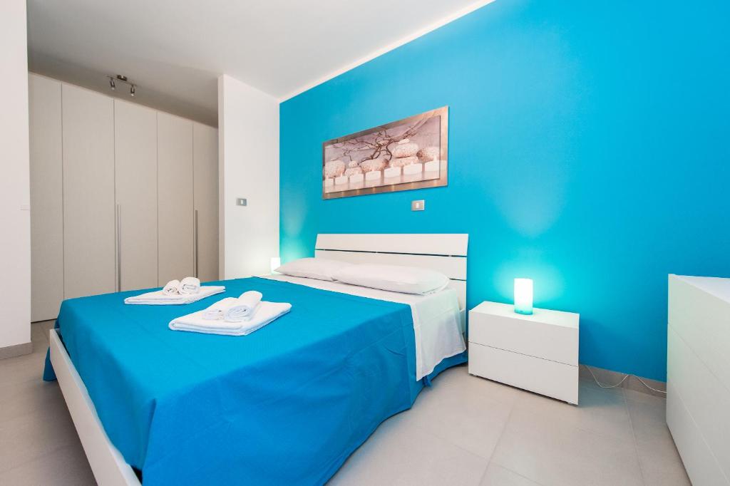 Postel nebo postele na pokoji v ubytování Blue Sky Apartments