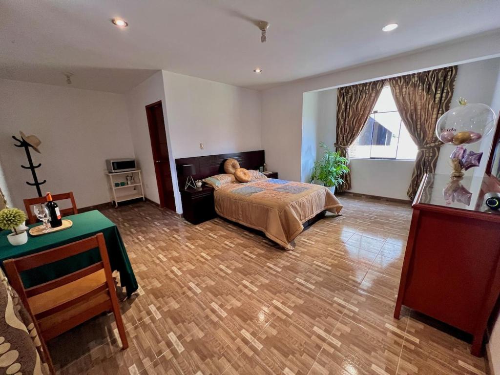 Ένα ή περισσότερα κρεβάτια σε δωμάτιο στο Casa Cubo Deluxe in La Molina