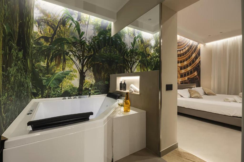 Postel nebo postele na pokoji v ubytování Lolli Boutique & SPA Al Massimo