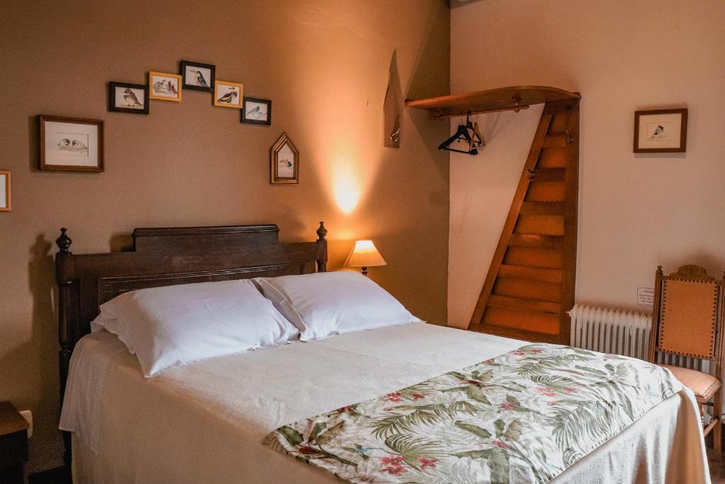 Ένα ή περισσότερα κρεβάτια σε δωμάτιο στο Pousada Don Giovanni