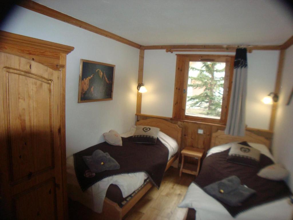 Postel nebo postele na pokoji v ubytování Chalet l'Avalin