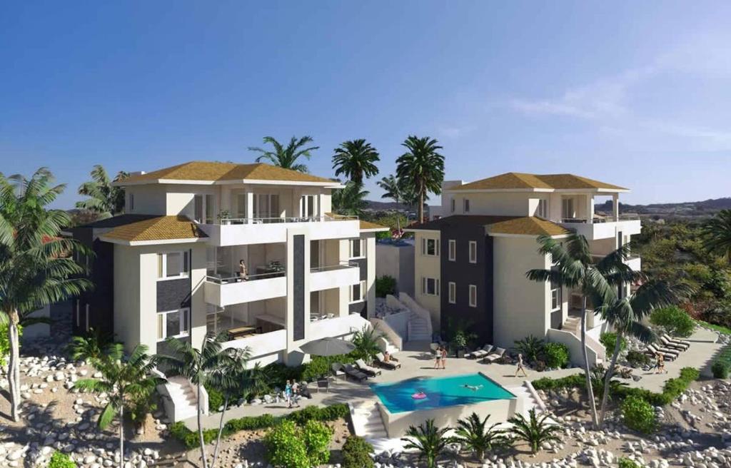 an aerial view of a villa with a swimming pool at Tidal Tranquility - Aquamarine 3 in Sint Michiel
