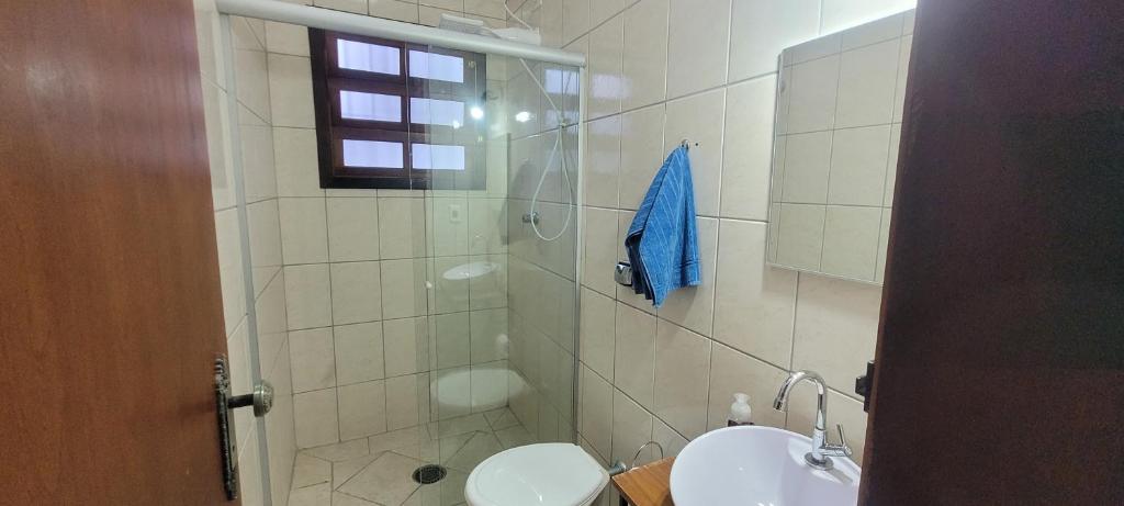 Koupelna v ubytování BareSun casa para 12 pessoas em Barequeçaba