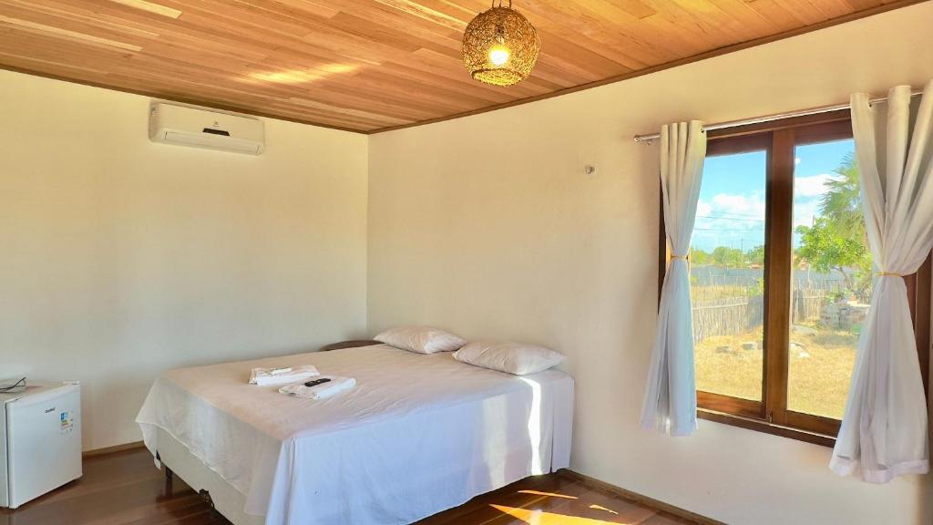 Postel nebo postele na pokoji v ubytování Sun Beach Macapa