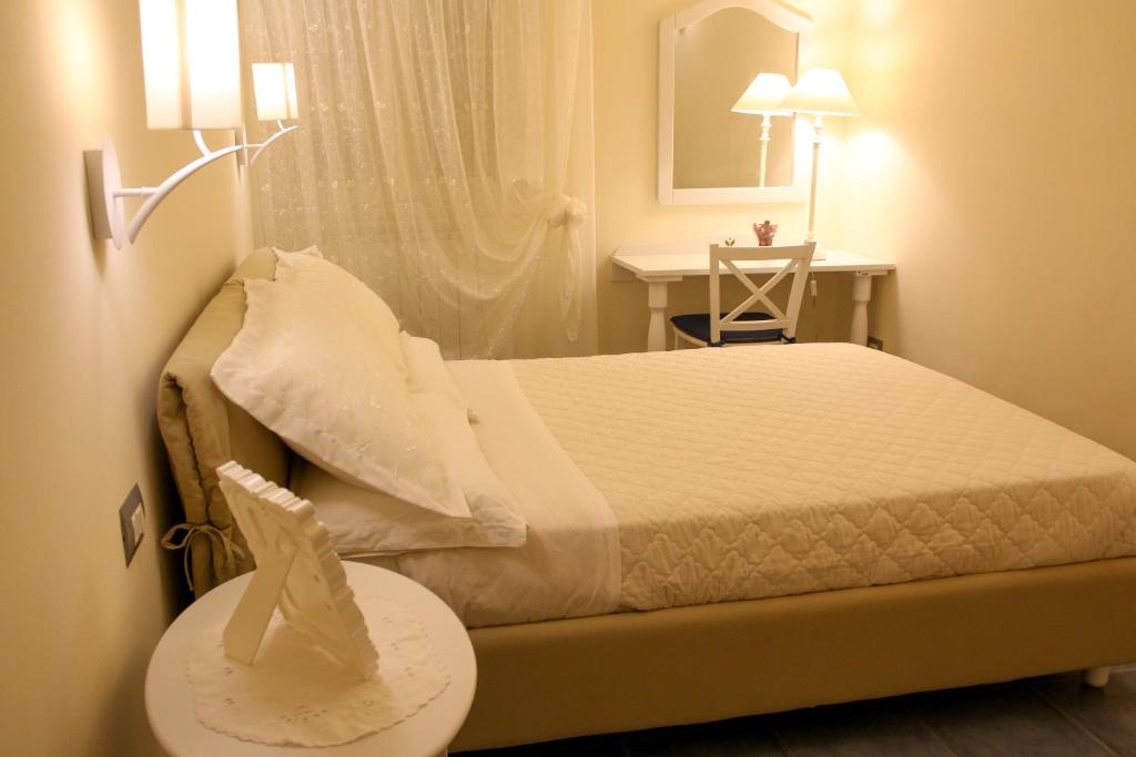 Posteľ alebo postele v izbe v ubytovaní Anthos Casa Vacanze