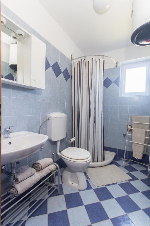 Koupelna v ubytování Apartments Roža