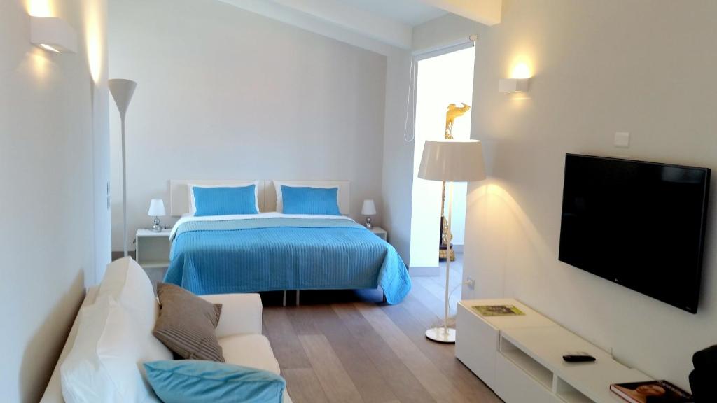 Postel nebo postele na pokoji v ubytování B&B Unique