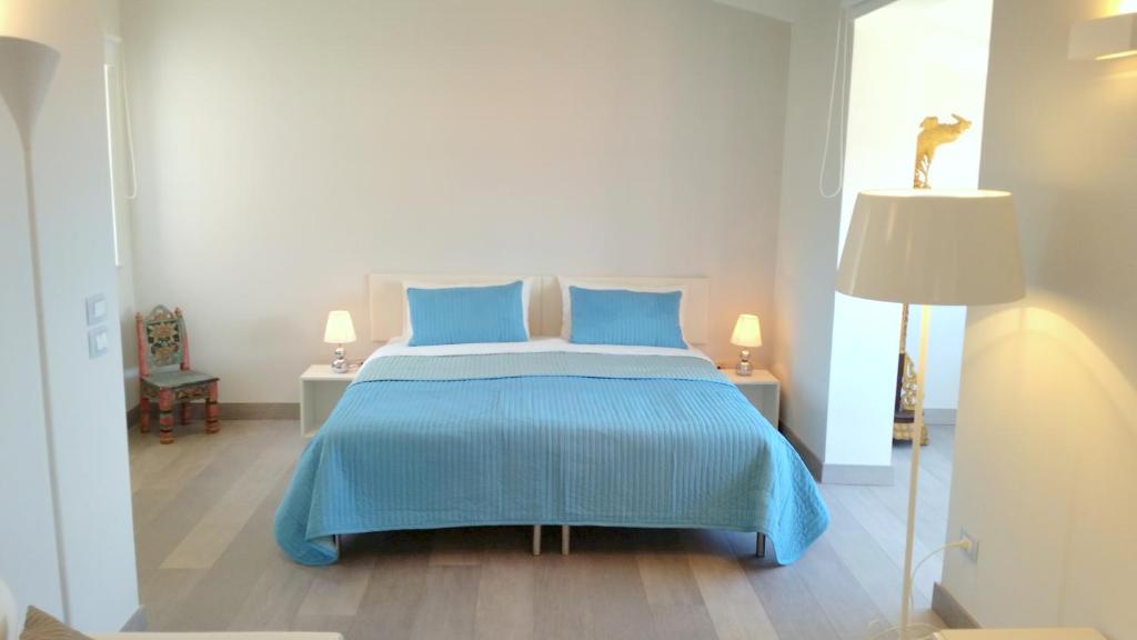 Postel nebo postele na pokoji v ubytování B&B Unique