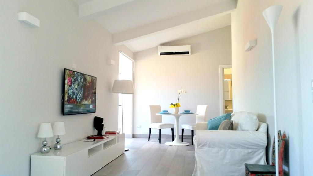 TV a/nebo společenská místnost v ubytování B&B Unique