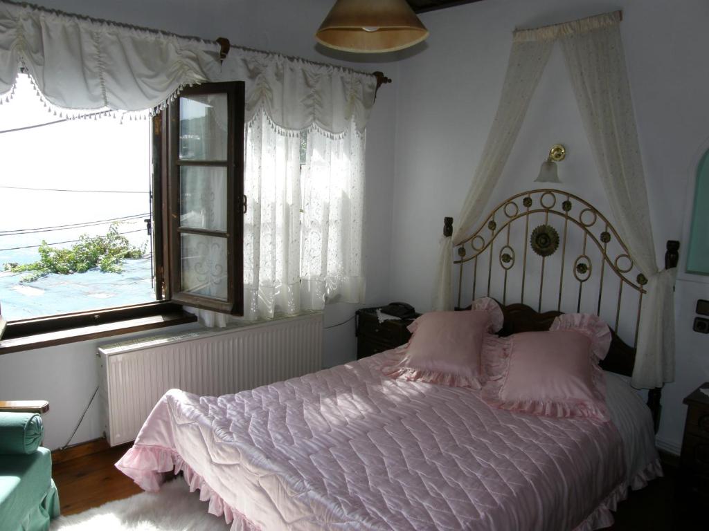 Postel nebo postele na pokoji v ubytování Mansion Theodora