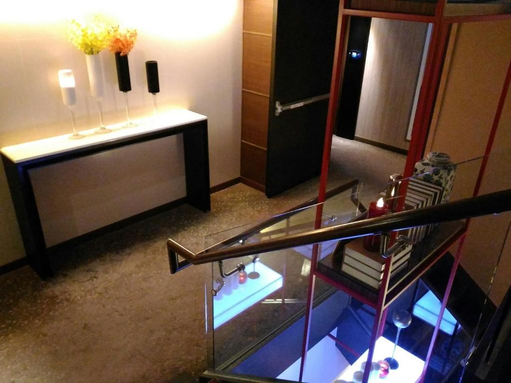 TV a/nebo společenská místnost v ubytování Aqua Bella Hotel