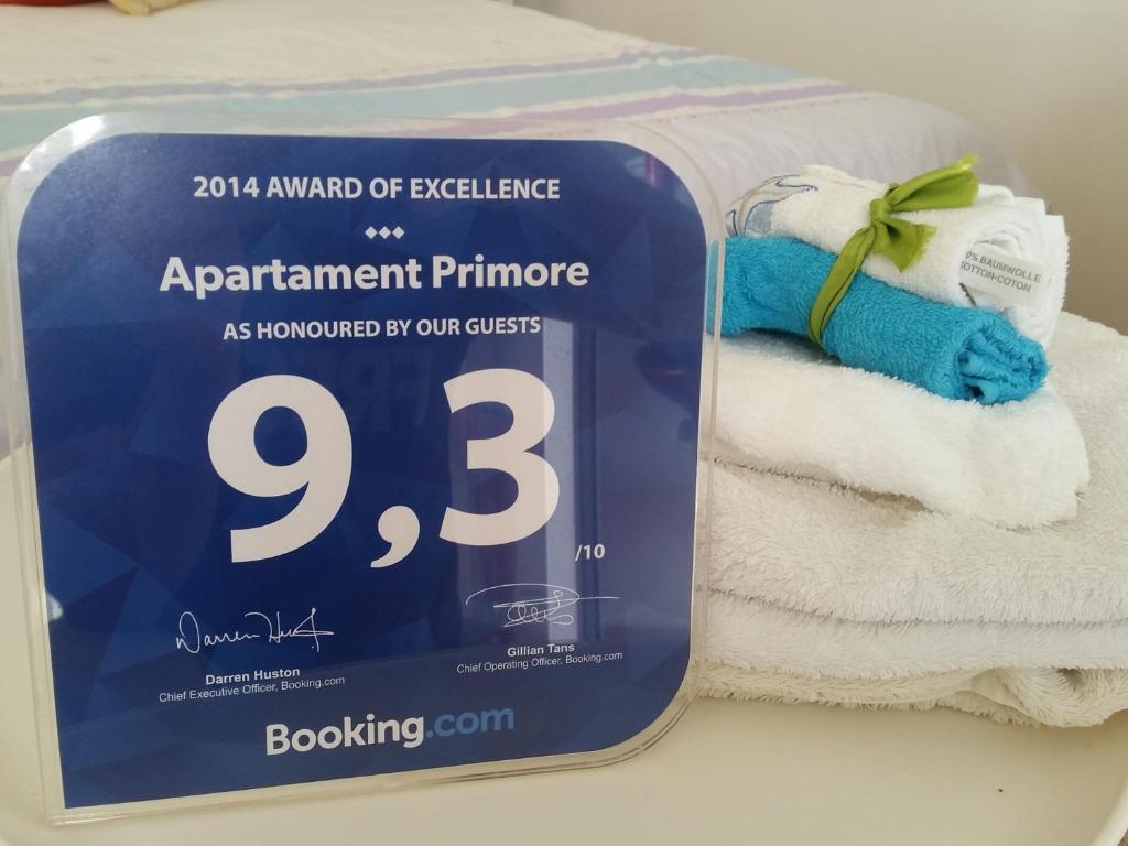 Palkinto, sertifikaatti, kyltti tai muu asiakirja, joka on esillä majoituspaikassa Apartament Primore