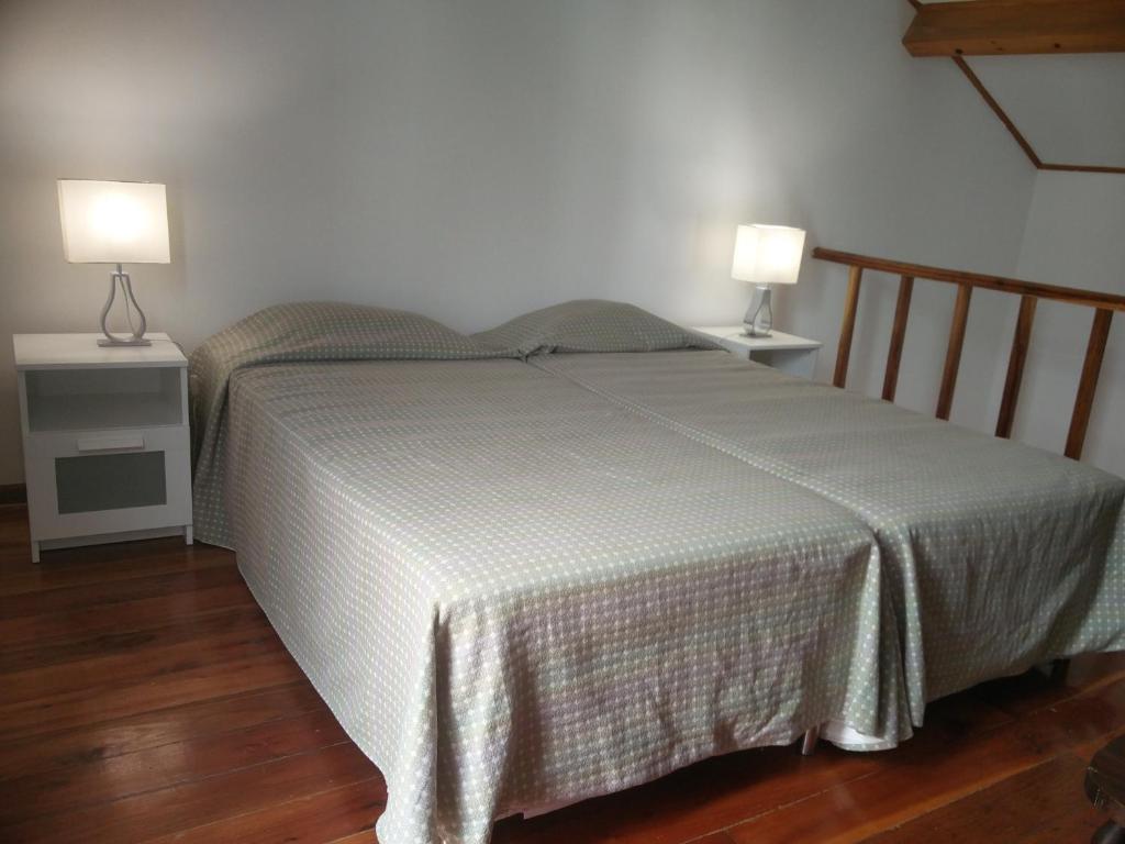 Postel nebo postele na pokoji v ubytování Apartamentos da Galé