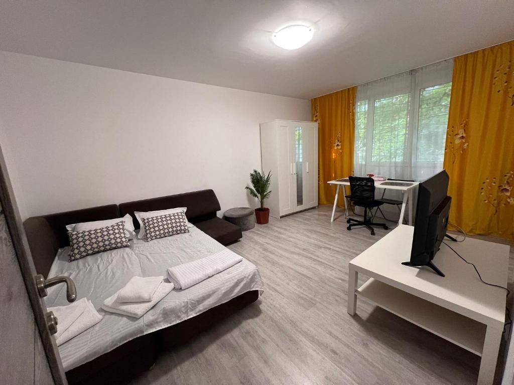 Ένα ή περισσότερα κρεβάτια σε δωμάτιο στο Garsoniera langa Spital Bagdasar,Obregia și Institutul pentru ordine publica NU OFER FACTURA