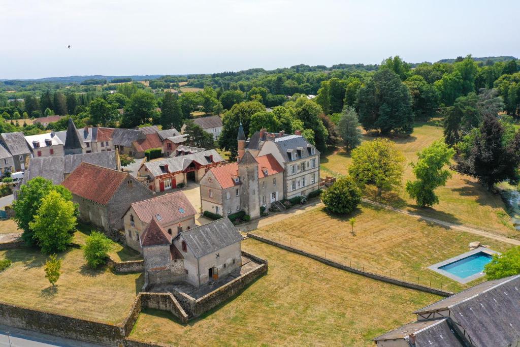 an aerial view of a large estate with a mansion at Domaine Les Malaitries - Château de La Chapelle Baloue 