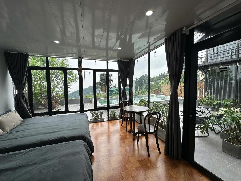 Et opholdsområde på Ơ Homestay - Phòng full kính Tam Đảo