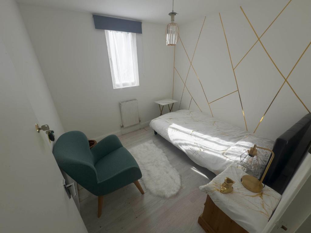Ένα ή περισσότερα κρεβάτια σε δωμάτιο στο Room Near Wembley Stadium & BBC, Lorry parking