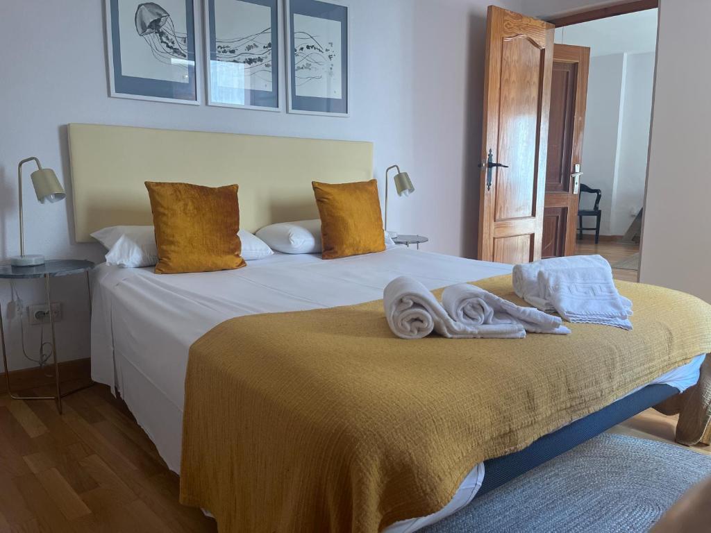 Ένα ή περισσότερα κρεβάτια σε δωμάτιο στο Rincon San Gil